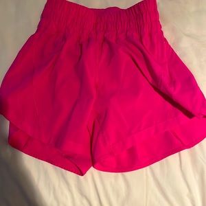 A pink Lululemon short never worn